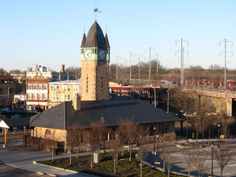 Looking northeast at Elizabeth Station. In the foreground is the historic Central Railroad of New Jersey station and clock tower. In the background is the current New Jersey Transit station.