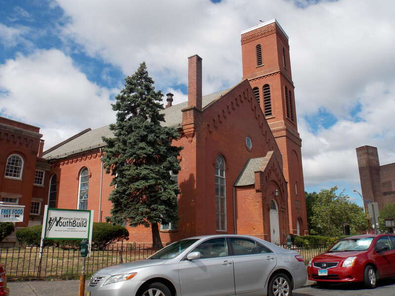 The former First Presbyterian Church and Iglesia Presbiteriana Hispana de Paterson on Main Street in Paterson, New Jersey. Starting in 2020, the New Jersey Community Development Corporation has been at work on renovating the former church to become a