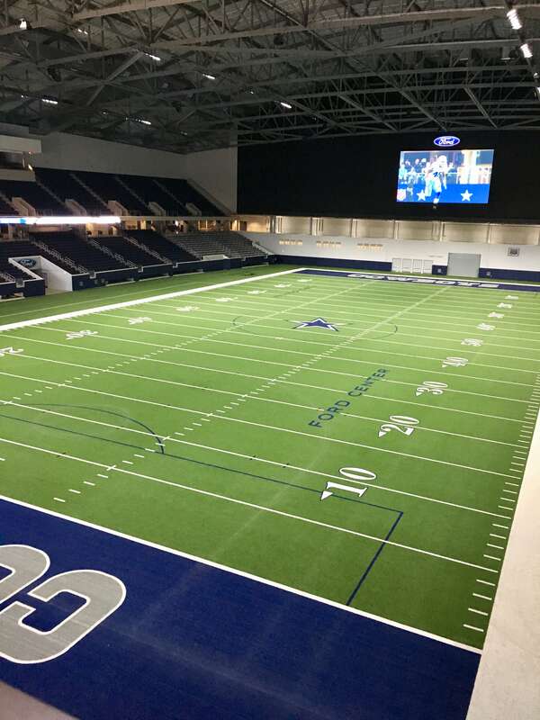 Enclosed and climate controlled regulation football field at Ford Center at the Star in w:Frisco, Texas, May 2018.