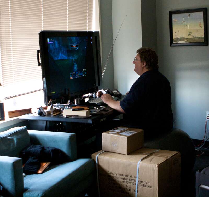 Gabe Newell, Co-founder of Valve, playing World of Warcraft on his massive screen in his office.