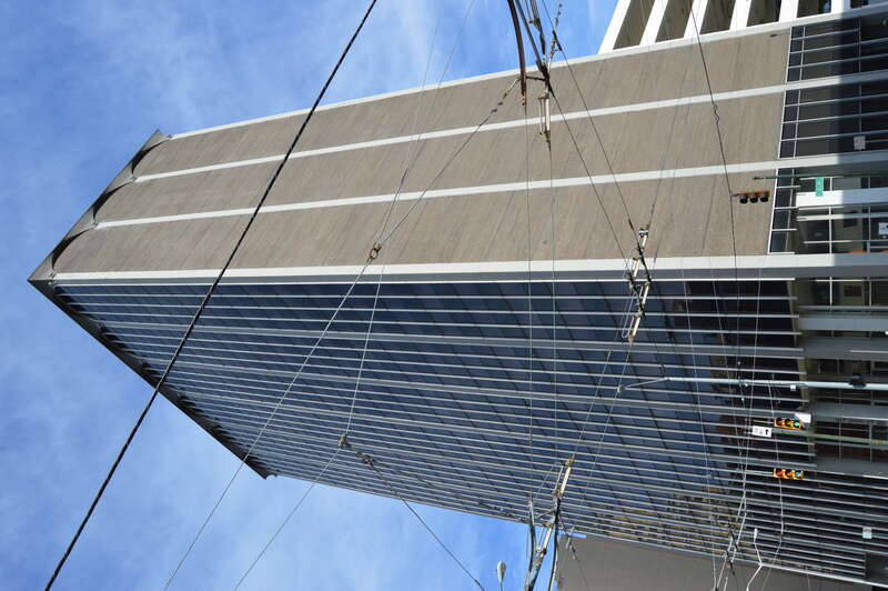 Northern and western sides of the Grant-Deneau Tower, located at the intersection of Fourth and Ludlow Streets in downtown Dayton, Ohio, United States.  Built in 1969, it is listed on the National Register of Historic Places.