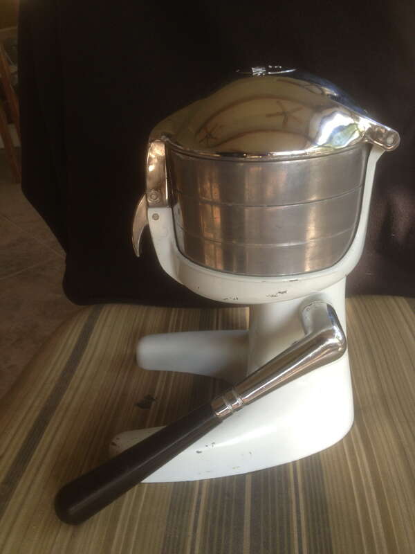 Side view of Juice King model JK-40 manual juicer.