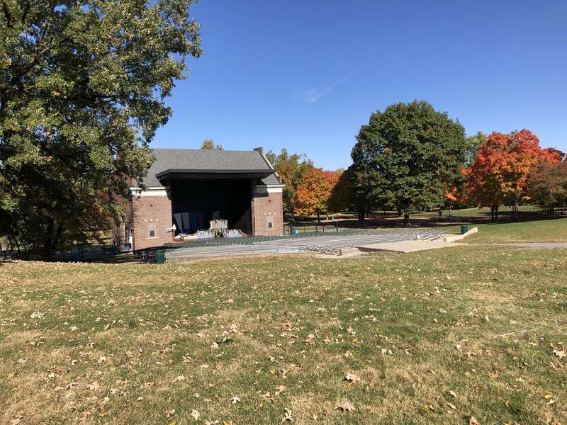 This image depicts the MacAllister Center for the Performing Arts at Garfield Park in Indianapolis, Indiana, U.S. The amphitheater was completed in 1922 and named after civic leader and philanthropist Pershing Edwin (P. E.) MacAllister in 1997.