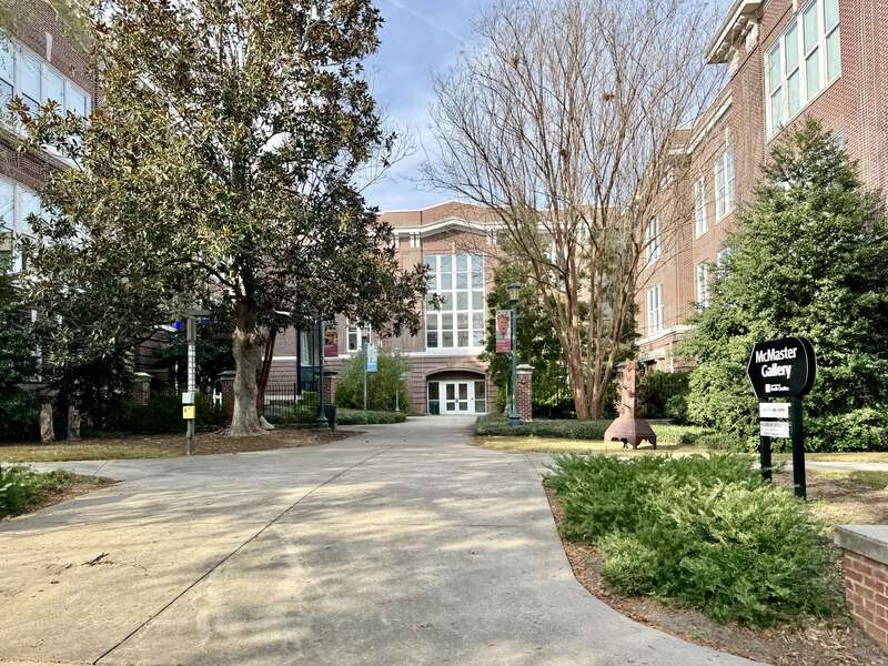 Built in 1911, this Classical Revival-style building was designed by Edwards and Walter to serve as the McMaster School, a segregated whites-only public school.  The building features a red brick exterior, a rusticated base, one-over-one windows, a