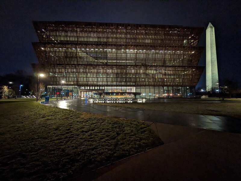 National Museum of African American History and Culture and Washington Monument at night
