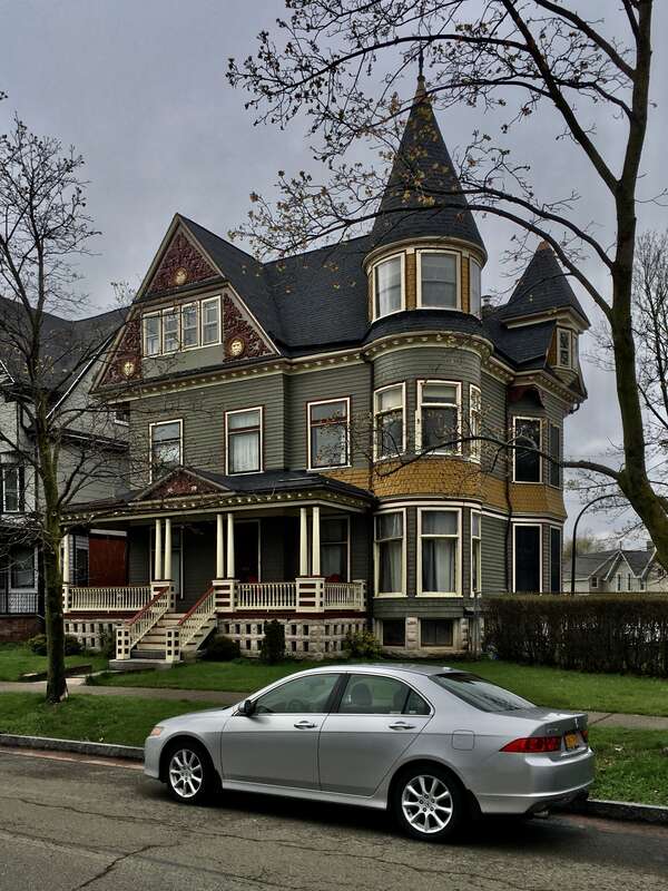 The Seymour Knox House, 414 Porter Avenue at Plymouth Avenue, Buffalo, New York, May 2020. The work of notable local architect Milton Beebe, the resplendent Queen Anne design of this beautiful c. 1890 house includes intricate plaster ornamentation in