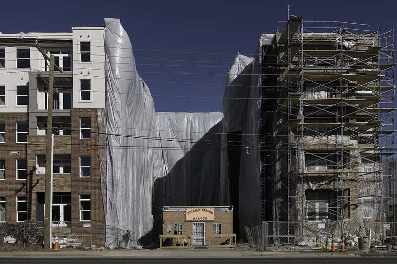When developers planned their massive series of apartment communities up and down Central Ave, in Charlotte, NC, they told many businesses to #GetOutOfMyPicture. Owners of the Thirsty Beaver Saloon refused, causing developers to literally work around