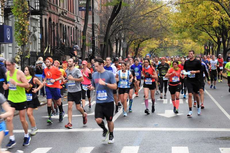 Looking west as runners turn from 120th St to 5th Ave