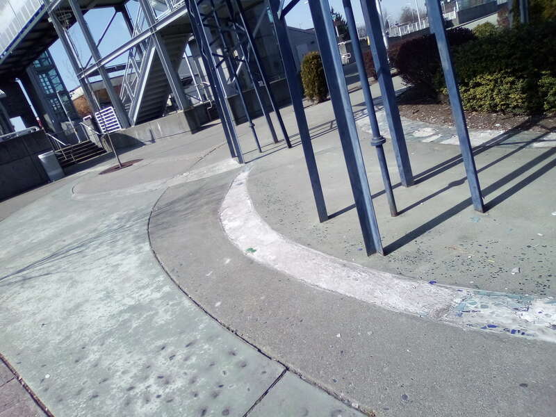 Disintegrating mosaic at Kent station.