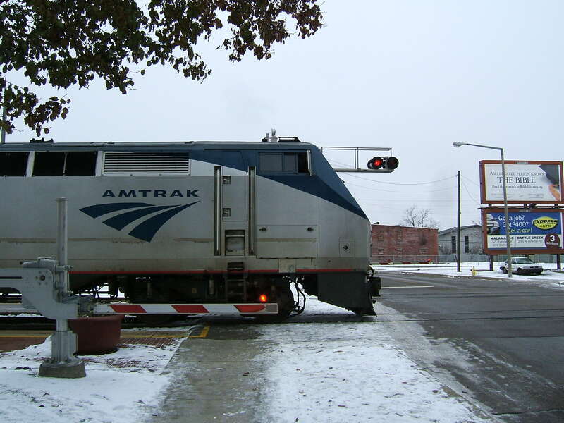 Amtrak loco on the level crossing