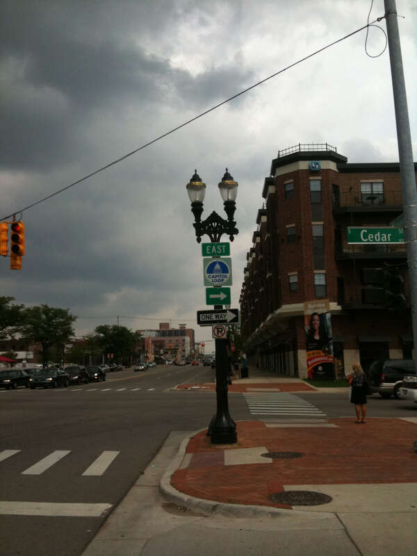 A reassurance marker for the Capitol Loop at Michigan Avenue and Cedar Street in Lansing, Michigan