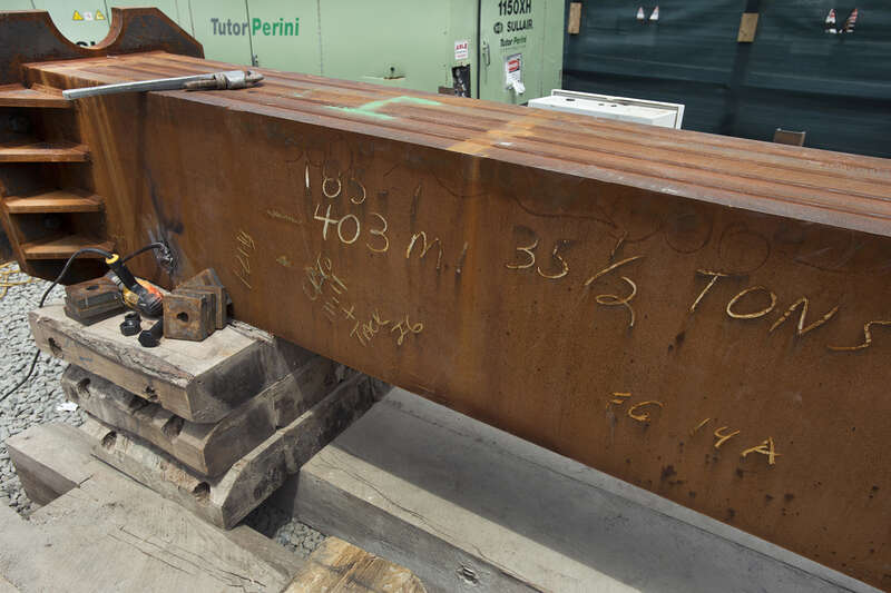 Giant cranes and boring machines work in tight quarters with the Long Island Rail Road’s 24/7 operations at the LIRR west side storage yard to construct the platform that will support the office towers, apartments and shopping center of a new