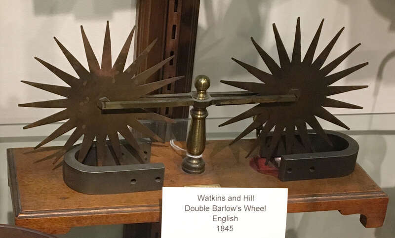 A Barlow wheel, an early experiment demonstrating the principle of a homopolar electric motor, invented by English mathematician Peter Barlow in 1822. This model consisting of two wheels in series was produced by the scientific instrument maker