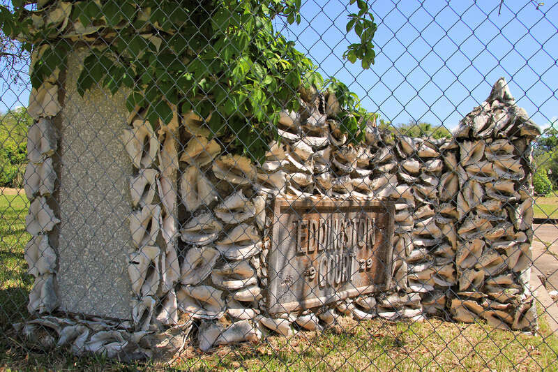 The conch shell gate at the entrance to Eddingston Court in Port Arthur, Texas, United States. The gate is a sculpture by Dionicio Rodriguez.