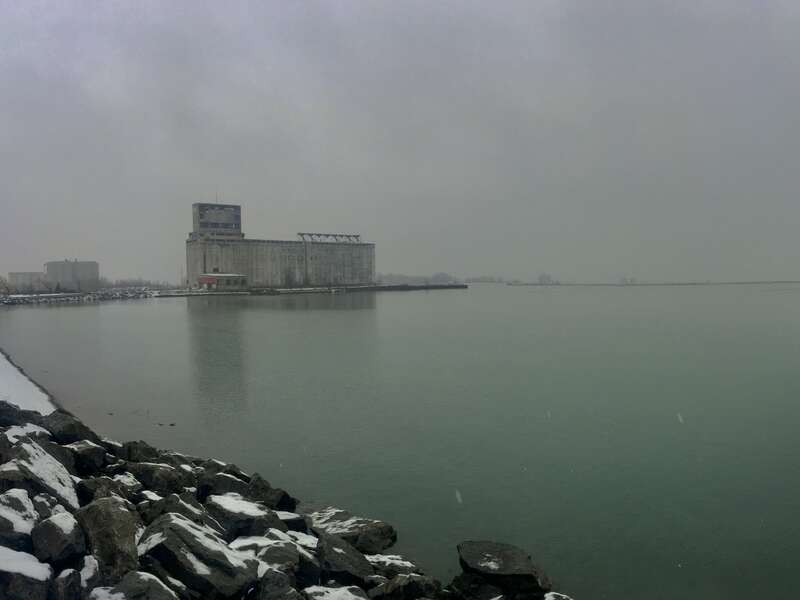 Gallagher Beach in Buffalo, New York as seen on a foggy February 2020 afternoon. The Cargill Pool Elevator is seen in the background just left of center; further in the background at the far left is the former St. Lawrence Cement Company terminal,