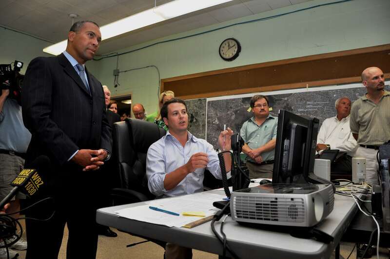 Governor Patirck listens as Andy Paul, a MassDOT Traffic Engineer, explains how engineers monitor and manage traffic while the 93 Fast 14 bridges are being constructed. 
The 93 Fast 14 Project is the perfect example of how the Patrick-Murray