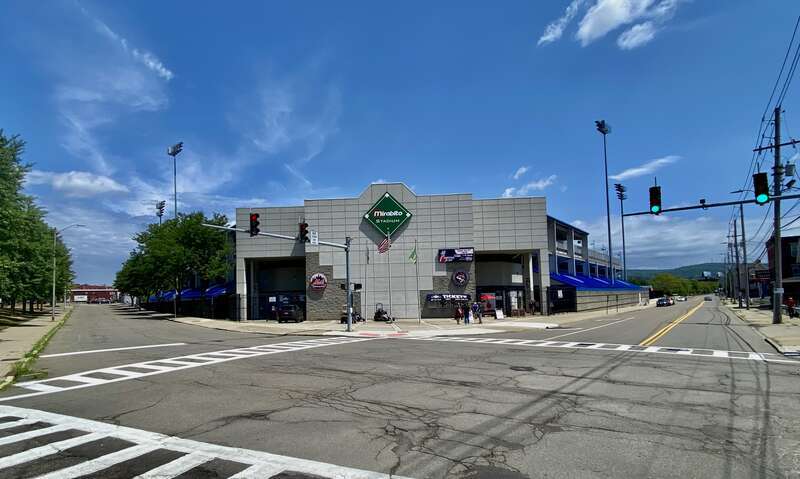 Mirabito Stadium in Binghamton, New York, as seen from the corner of Henry and Fayette Streets just before the start of a July 2022 game between the Binghamton Rumble Ponies and the visiting Hartford Yard Goats.