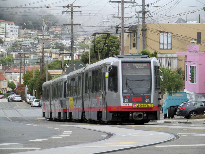 An inbound L Taraval train on Ulloa Street east of 15th Avenue in June 2017
