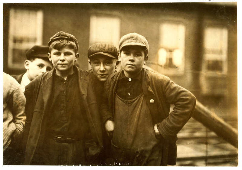 Andrew Stefanik, (on right hand). (see label 2637). Arthur Asslin, (on left) 118 Front St. Been working here one year. May be 14 or 15. Location: Chicopee, Massachusetts. Photograph by Lewis Wickes Hine, November 1911.

From the National Child Labor