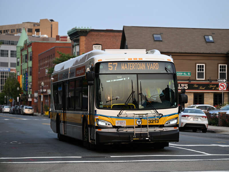 An MBTA 57 bus at Brighton Center in August 2024.