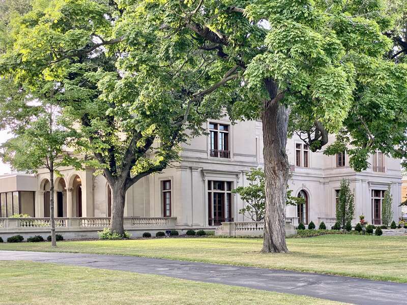 Built in 1915-18, this French Renaissance Revival-style mansion was designed by C. P. H. Gilbert for Grace Millard Knox, widow of Seymour H. Knox, whom was a co-founder of the F. W. Woolworth Company.  The house was inhabited by Grace Millard Knox