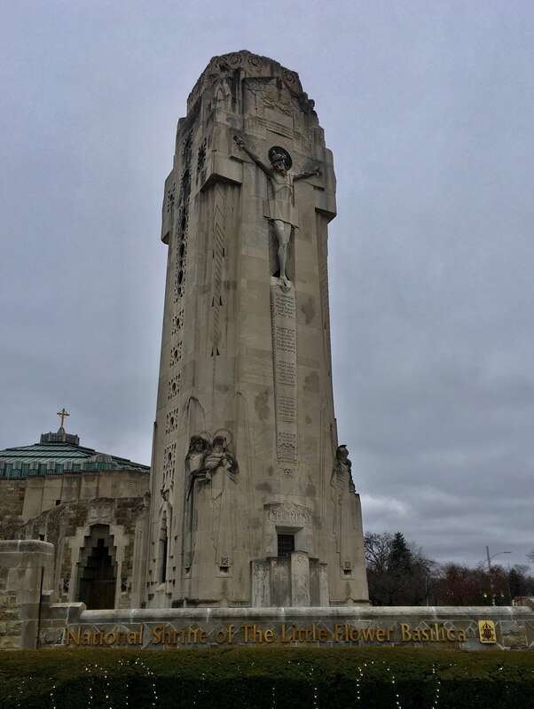 A stylized relief of the crucified Christ, sculpted by Rene Paul Chambellan, figures prominently on the tower of the majestic Art Deco-style National Shrine of the Little Flower in Royal Oak, Michigan, as seen in December 2020.