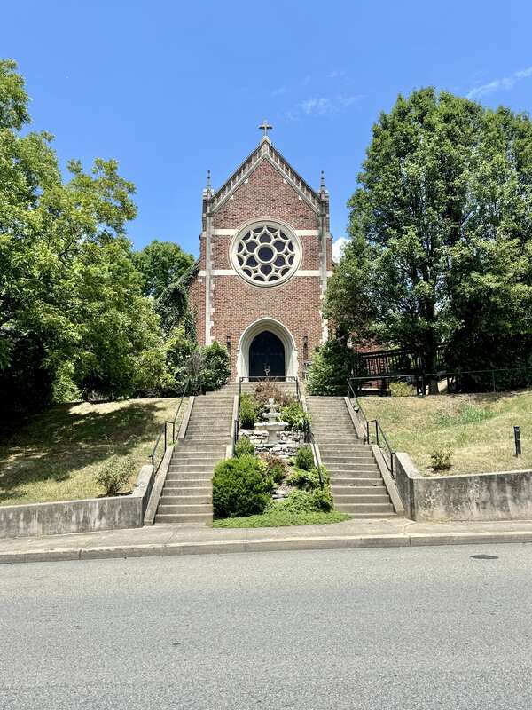 Built in 1931, this Gothic Revival-style building was constructed for the congregation of St. Mary’s Catholic Church, which was founded in 1902, and was originally located in an old Victorian-era mansion and a wood-frame chapel to the rear (north) of