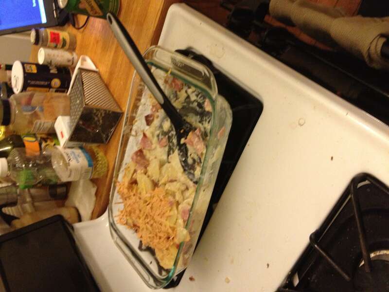 Homemade potato gratin with Gouda cheese and ham mixed in, after baking 45 minutes at 375 degrees Fahrenheit.