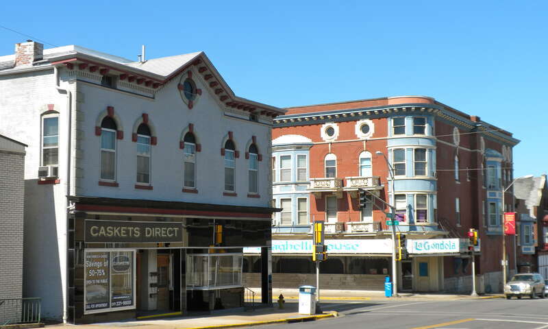 Buildings at State and Eighth Streets in Quincy, Illinois. Part of the South Side German Historic District, on the NRHP since May 22, 1992. The Historic District is roughly bounded by 6th, 12th, Washington, Jersey and York Sts.; with a boundary