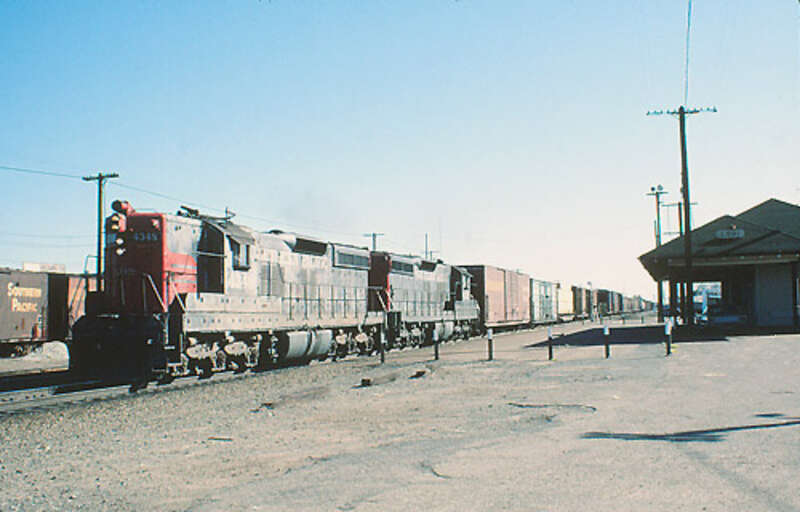 A Southern Pacific freight train passes the then-unused Lodi station in March 1980