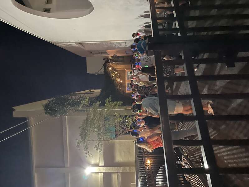 A image taken of a silent disco in a public location at Five Points in Jacksonville, Florida.