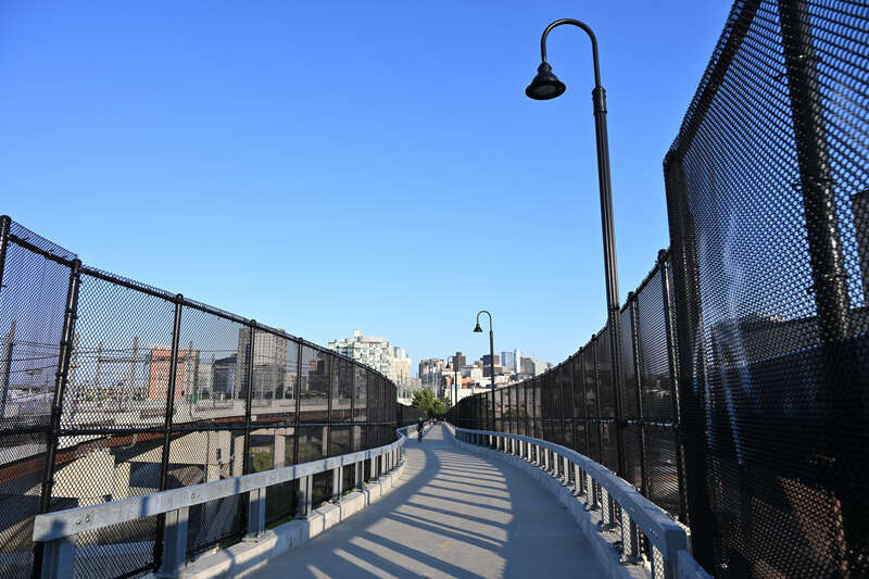 The southern portion of the Somerville Community Path, over the Green Line and Lowell Line tracks.