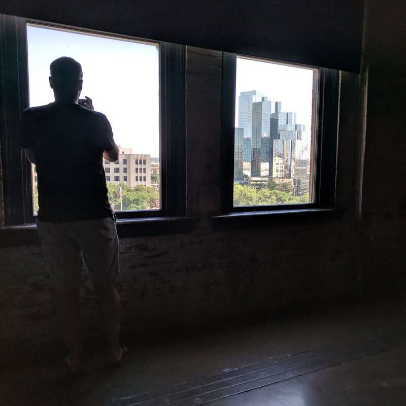 Seventh floor corner window (one floor up from the window where the shots were fired).