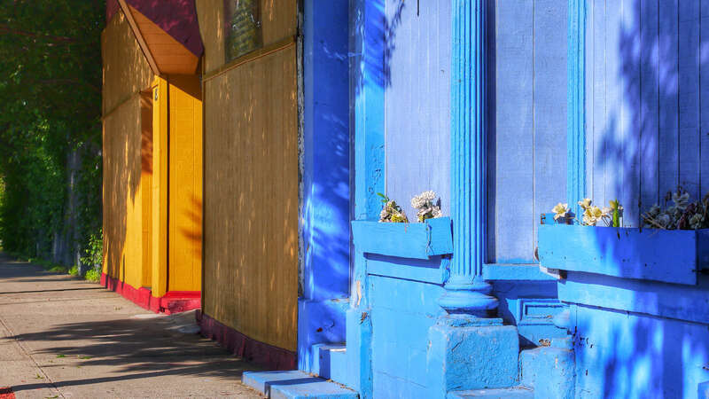 500px provided description: A corner of colors in Holyoke, MA [#yellow ,#color ,#blue ,#corner ,#street corner ,#holyoke]