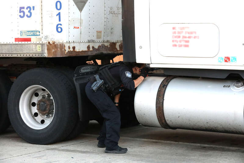 U.S. Customs and Border Protection Officers conduct outbound inspections at the Fort Street Port of Entry at the Ambassador Bridge. The Ambassador Bridge connects Detroit, Mich. and Windsor, On, and is the busiest international crossing in North