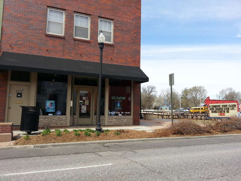 This image is one item in a group of eight, which contains a photograph of the exterior of each vapor-specific shop operating in Lincoln, Nebraska as of April 2014.  Incidentally, vaping is not a hobby of mine, but rather I took these images for