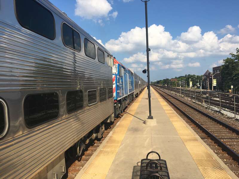 Two Metra trains coupled together.  The first had a mechanical malfunction out on the line.  The second pushed the first into the Chicago terminal at the Ogilvie Center.
