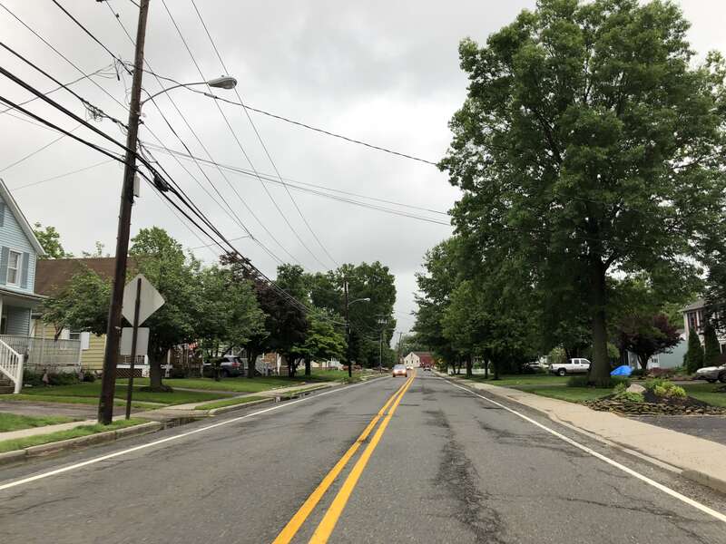 View south along Monmouth County Route 527 (Park Avenue) at Monmouth County Route 527 Alternate (Main Street) in Englishtown, Monmouth County, New Jersey