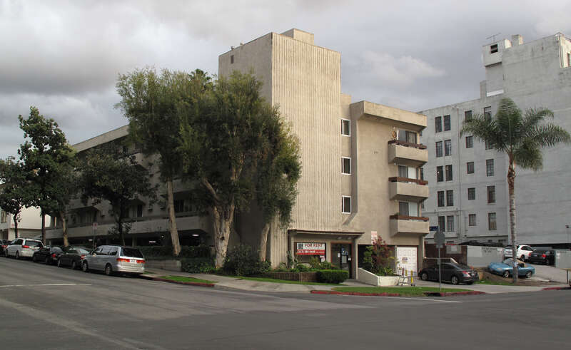 Apartment building at 500 S. Hobart Ave., Los Angeles, CA. The building design is typical of the neighborhood but the Brutalist facade is not.