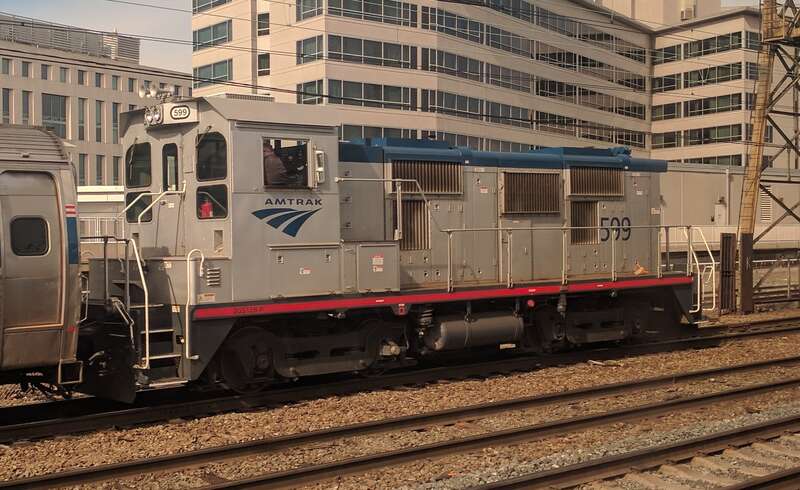 AMTK 599, a National Railway Equipment 2GS12B genset locomotive owned by Amtrak.