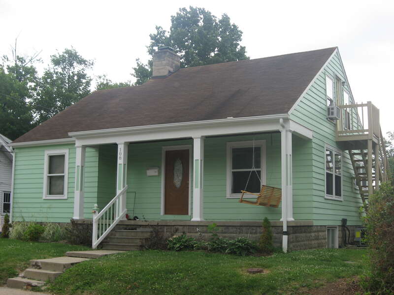 Front and western side of the house located at 108 E. Cottage Grove Avenue in Bloomington, Indiana, United States.  Built in 1925, it is part of the locally-designated Cottage Grove Historic District.