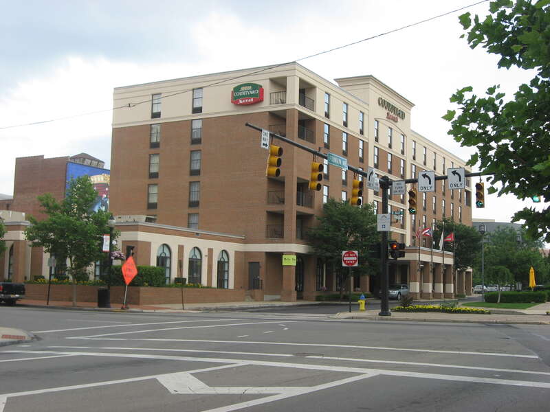 Northern and western sides of a Courtyard by Marriott on the southeastern corner of High Street and Fountain Avenue in downtown Springfield, Ohio, United States.  It occupies the site of the Arcade Hotel, which was built in 1883 and listed on the