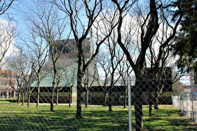 The former Cathedral of the Immaculate Conception in Burlington, Vermont. The property, which has been listed for sale, is now surrounded by a chain link fence.