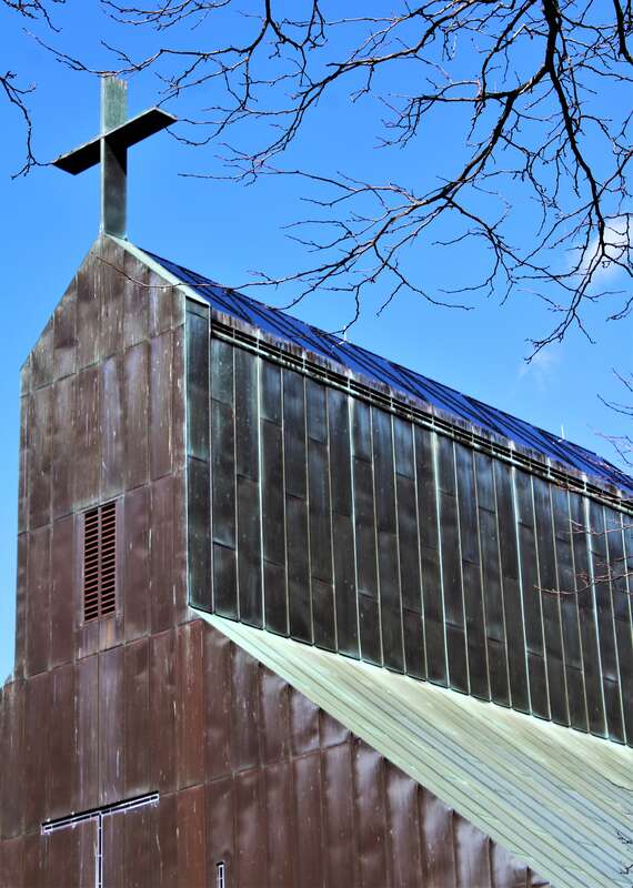 The former Cathedral of the Immaculate Conception in Burlington, Vermont. The property, which has been listed for sale, is now surrounded by a chain link fence.