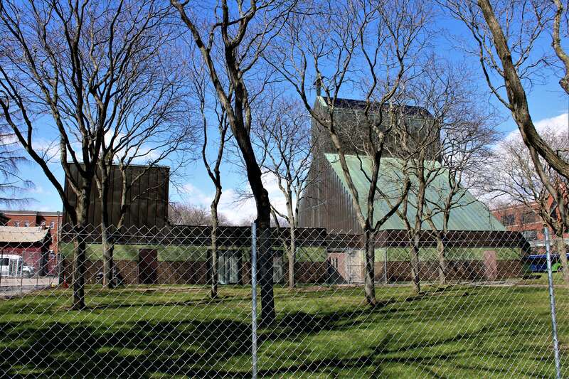 The former Cathedral of the Immaculate Conception in Burlington, Vermont. The property, which has been listed for sale, is now surrounded by a chain link fence.