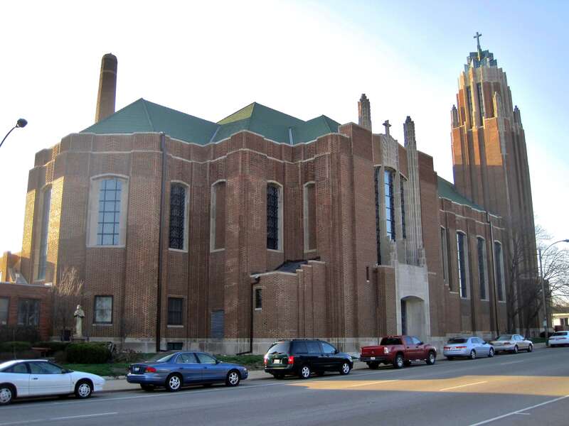 The Holy Trinity Church, Rectory, and Convent in Bloomington (1933). The church was built in 1933 to replace a church that had burned down. The rectory was built in 1896 in the Richardsonian Romanesque style. The Romanesque convent was completed in