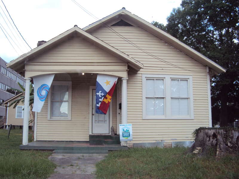 Photo of house on Washington Street in Lafayette, Louisiana.  

(Note: When photographed incorrectly assumed to be the Daigle House, which is listed on the National Register of Historic Places, but the house does not match description or photo of the