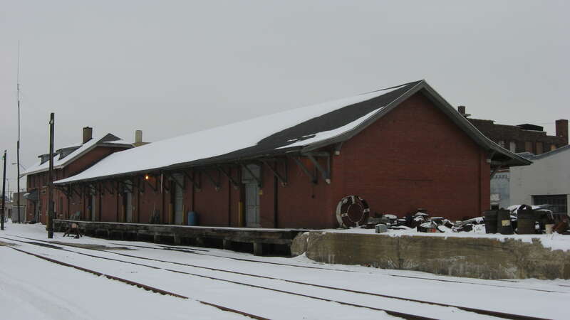 Rear and northern end of the former Lake Erie and Western Railroad train station in downtown Kokomo, Indiana, United States.  Built in 1916, it lies at the core of the Lake Erie and Western Depot Historic District, a historic district that is listed