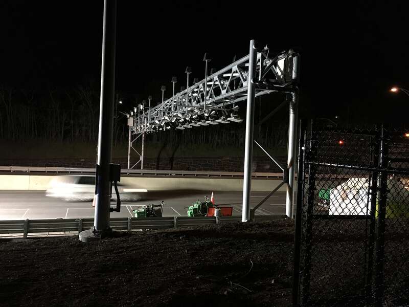 Electronic toll collection gantry over the Massachusetts Turnpike in Newton MA.