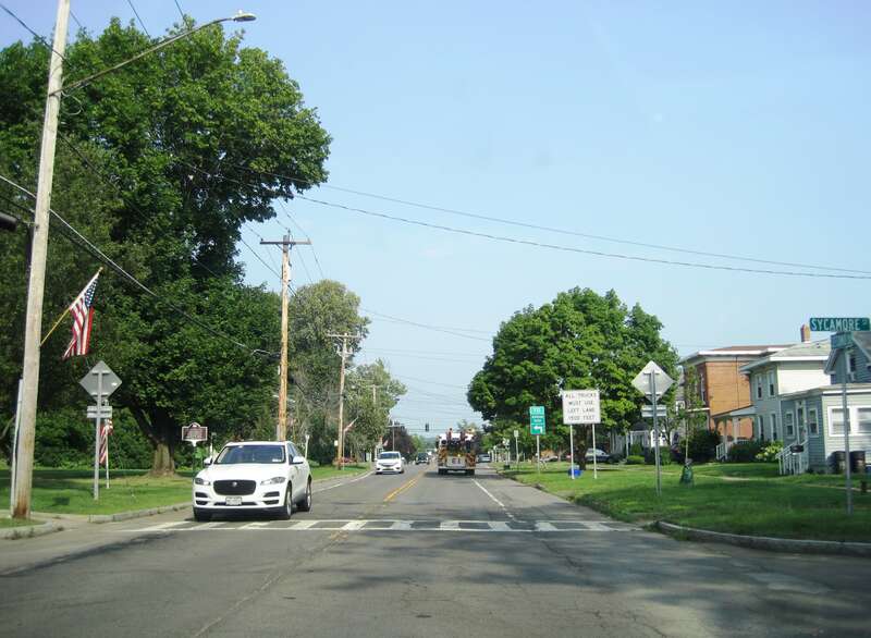 Photo of eastbound New York State Route 370 (Second Street) at Sycamore Street in the village of Liverpool, New York. Photo taken looking east-southeast.